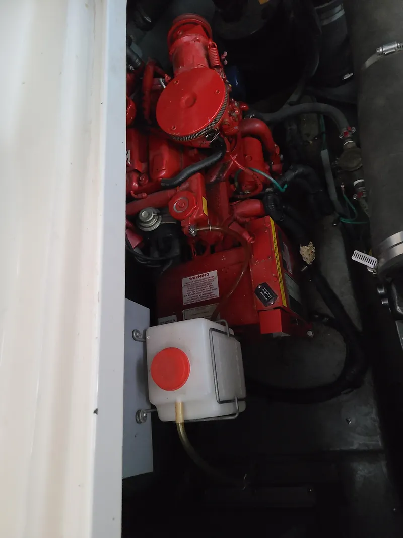 Slide: The Image of Engine compartment of a 1999 Sea Ray 340 Sundancer boat. - 22