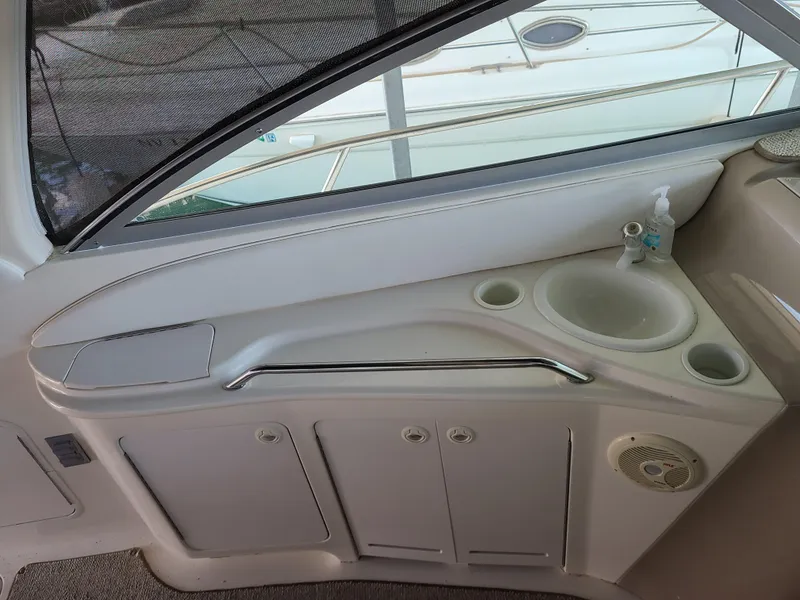 Slide: The Image of 1999 Sea Ray 340 Sundancer boat interior with sink. - 9