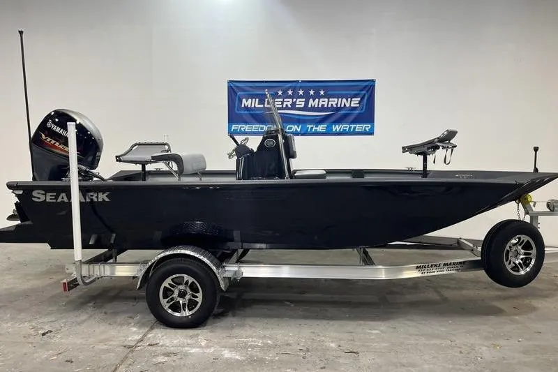 Slide: The Image of 2025 SeaArk Shadow 187T boat on trailer at Miller's Marine showroom. - 0