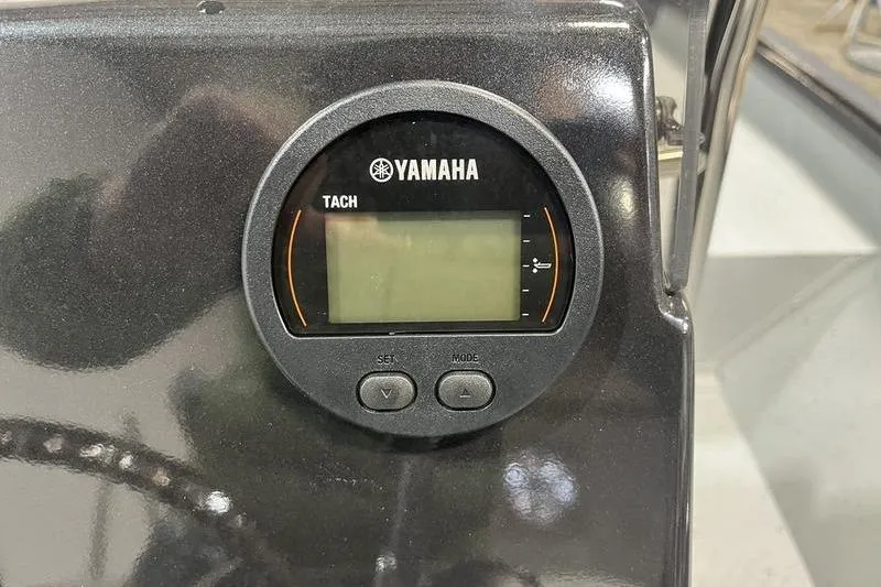 Slide: The Image of Yamaha tachometer on 2025 SeaArk Shadow 187T boat dashboard. - 10