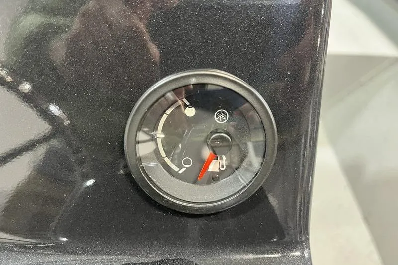 Slide: The Image of Fuel gauge on 2025 SeaArk Shadow 187T boat dashboard. - 11