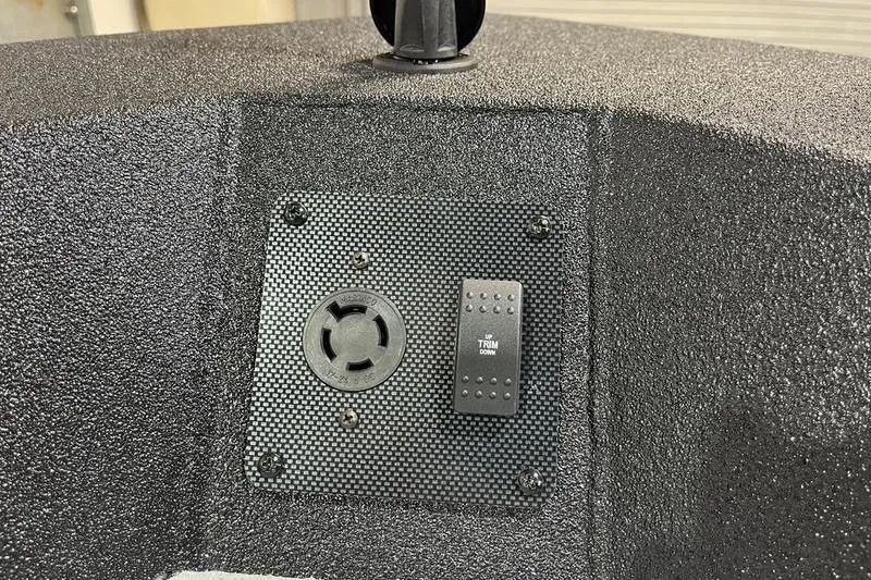 Slide: The Image of Control panel on 2025 SeaArk Shadow 187T boat, featuring a trim switch. - 16