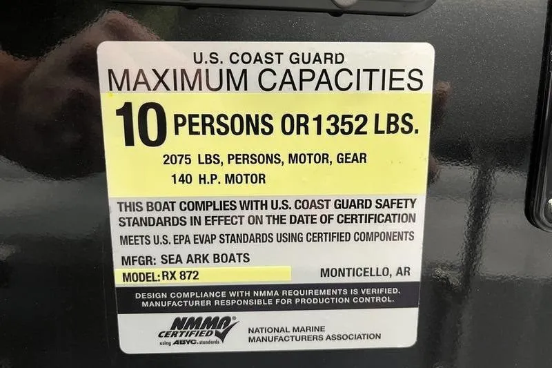 Slide: The Image of SeaArk Shadow 187T 2025 boat capacity label, 10 persons or 1352 lbs, 140 HP motor. - 17