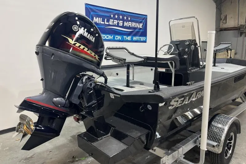 Slide: The Image of 2025 SeaArk Shadow 187T boat with Yamaha VMAX engine at Miller's Marine showroom. - 3