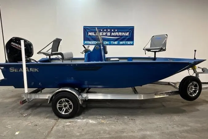 The Image of 2025 SeaArk Shadow 187T boat on trailer at Miller's Marine showroom. - 0