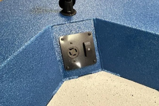 Slide: The Image of Blue textured interior of 2025 SeaArk Shadow 187T boat with control panel. - 11