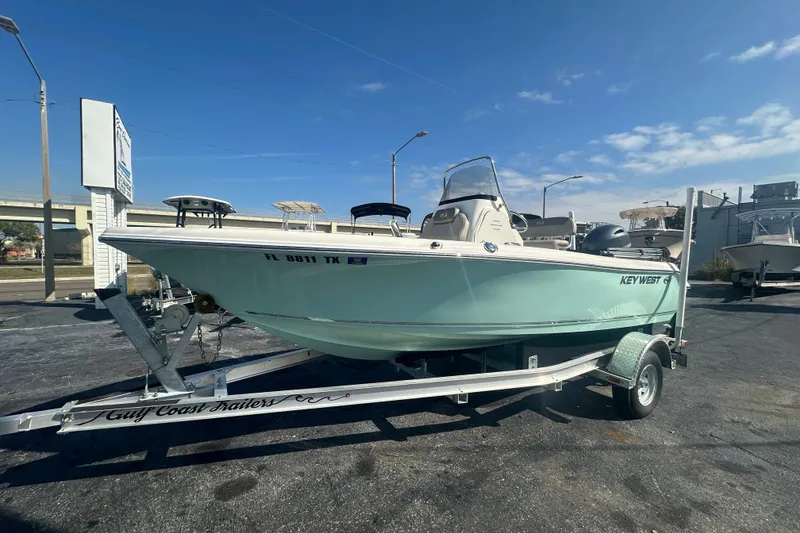 The Image of 2024 Key West 189 FS boat on trailer under clear blue sky. - 0