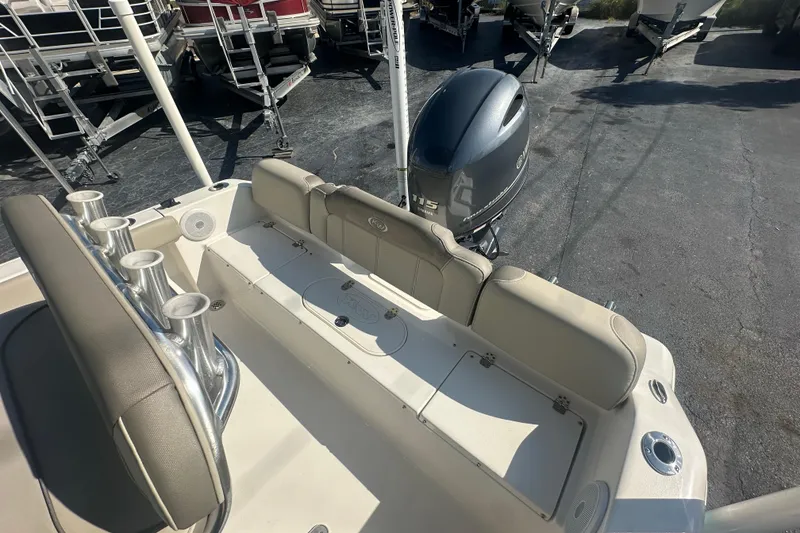 Slide: The Image of 2024 Key West 189 FS boat with Yamaha 115 engine, featuring comfortable seating and rod holders. - 24