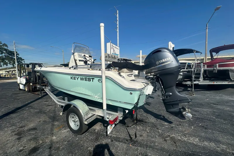 Slide: The Image of 2024 Key West 189 FS boat with Yamaha outboard motor on trailer. - 3