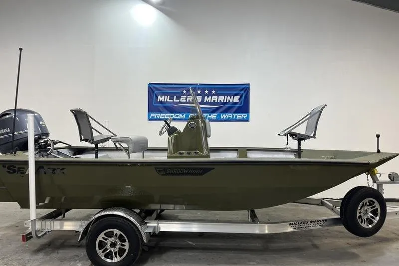 The Image of 2025 SeaArk Shadow 187J boat on trailer at Miller's Marine showroom. - 0