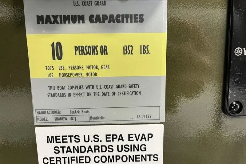 Slide: The Image of SeaArk Shadow 187J 2025 boat capacity label, 10 persons or 1352 lbs, EPA compliant. - 14