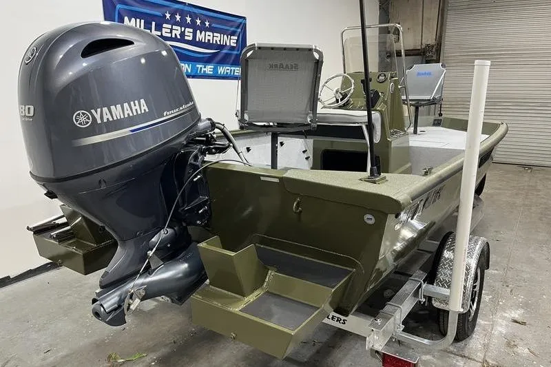 Slide: The Image of 2025 SeaArk Shadow 187J boat with Yamaha motor in showroom. - 3