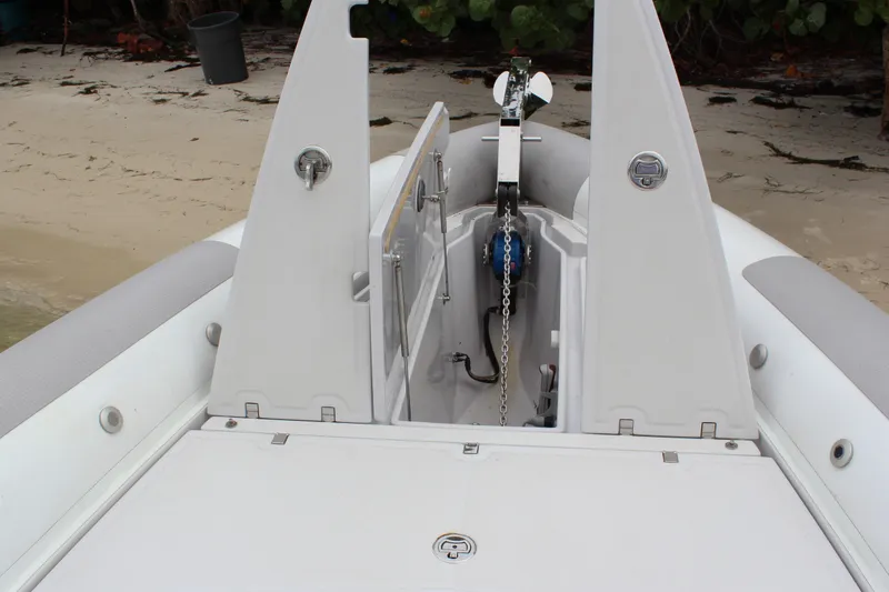 Slide: The Image of Zeta Elle 34 Custom 2013 boat anchor compartment on sandy beach. - 12