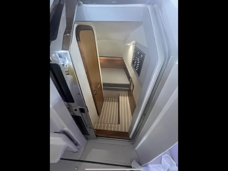 Slide: The Image of Interior cabin of 2013 Zeta Elle 34 Custom boat with wooden flooring and modern design. - 25