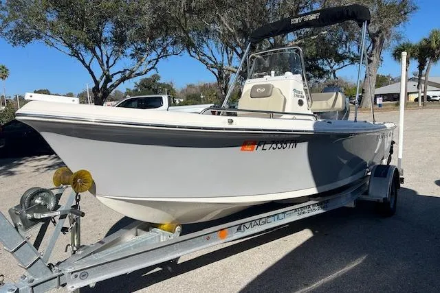 The Image of 2023 Key West 1720 Center Console boat on trailer, parked outdoors. - 7