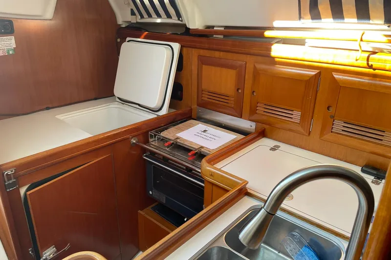 Slide: The Image of Open refrigerator compartment in 2001 Beneteau Oceanis 361 sailboat interior. - 17