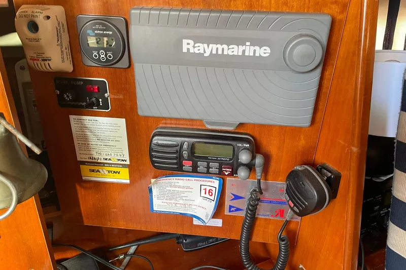 Slide: The Image of Control panel of a 2001 Beneteau Oceanis 361 sailboat with navigation and communication equipment. - 28