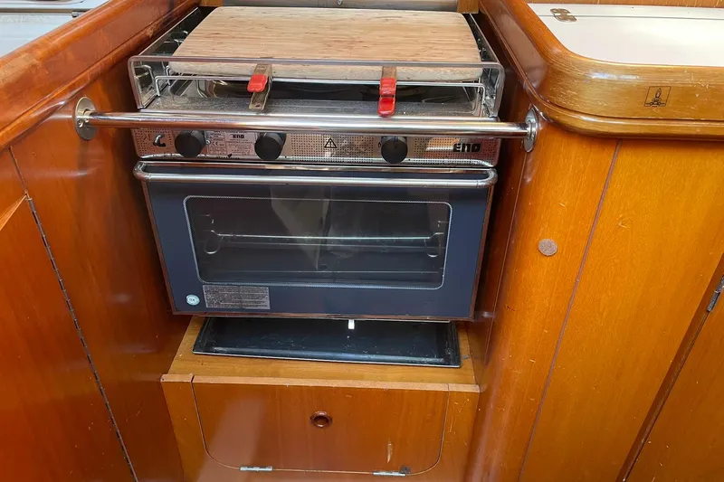 Slide: The Image of Beneteau Oceanis 361 yacht kitchen with stove and oven, 2001 model. - 37