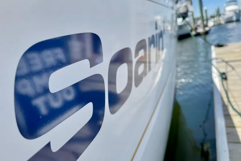 Slide: The Image of Close-up of "Soaring" on a 2001 Beneteau Oceanis 361 yacht docked by water. - 65