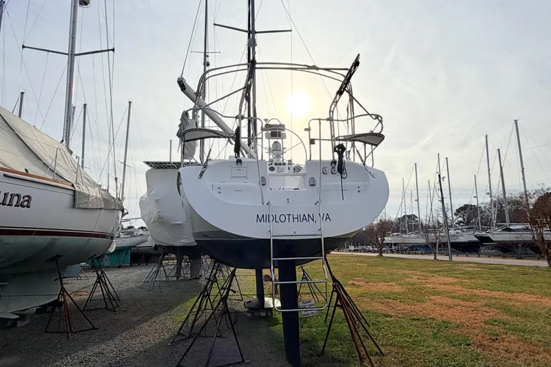 Slide: The Image of 2001 Catalina 380 sailboat on stands in a marina, Midlothian, VA. - 2