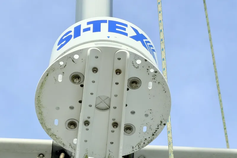 Slide: The Image of Radar mount on Catalina 380 sailboat mast, featuring SI-TEX branding, 2001 model. - 43