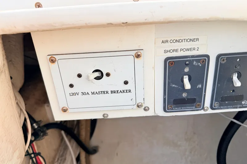 Slide: The Image of Electrical panel on a 2001 Catalina 380 boat with 120V 30A master breaker. - 51