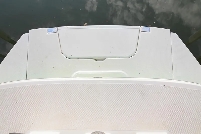 Slide: The Image of 2023 Cobalt CS22 boat swim platform with water reflection. - 12