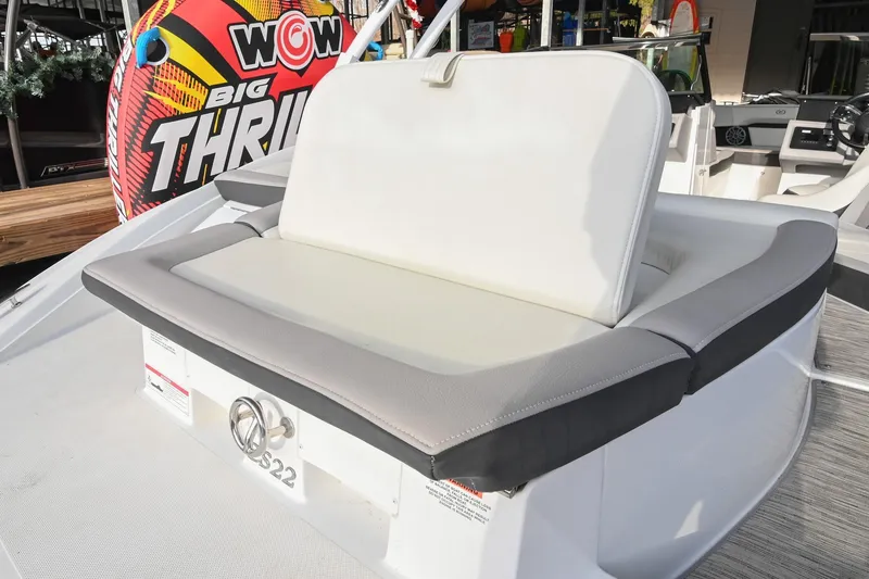 Slide: The Image of 2023 Cobalt CS22 boat with comfortable seating and vibrant water sports equipment. - 15