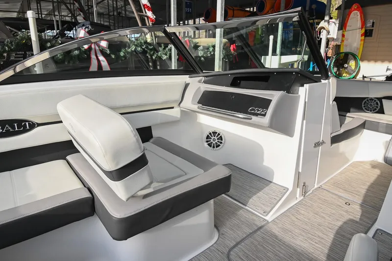 Slide: The Image of 2023 Cobalt CS22 boat interior with modern seating and dashboard design. - 26