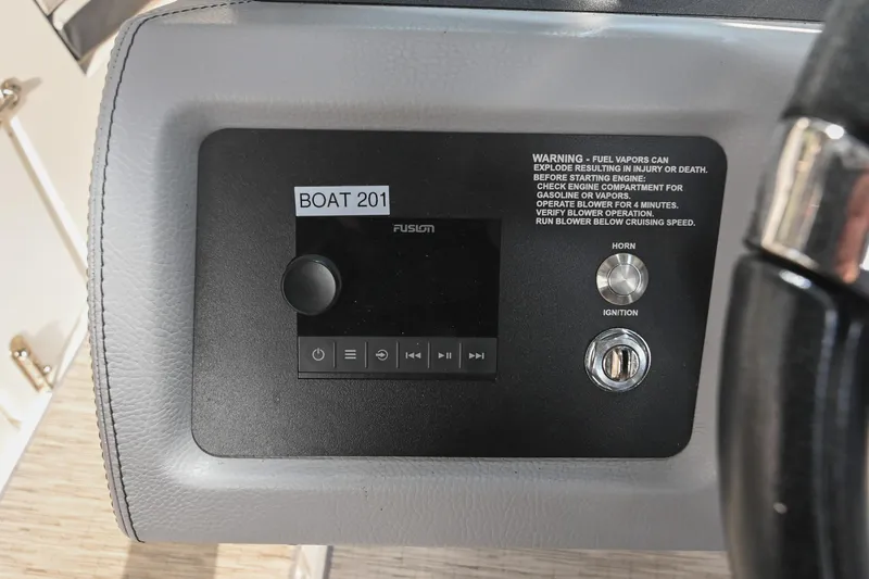 Slide: The Image of Control panel of 2023 Cobalt CS22 boat with ignition and warning label. - 33