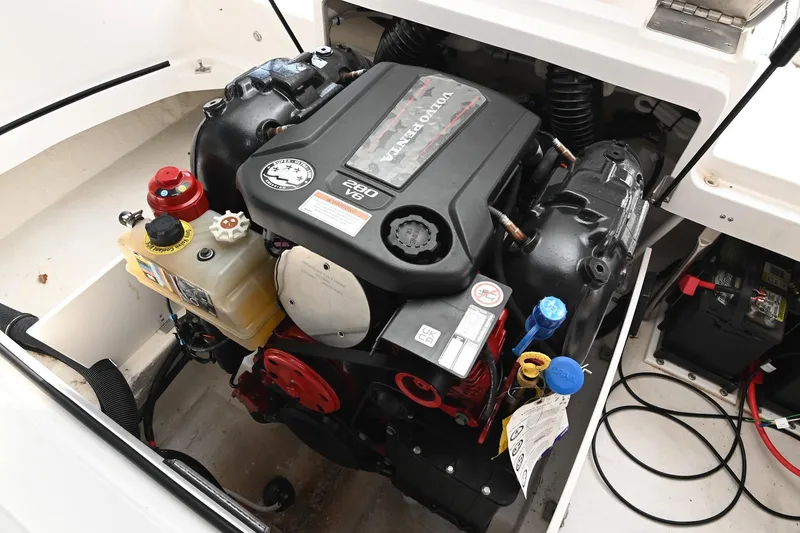 Slide: The Image of Engine compartment of 2023 Cobalt CS22 boat, featuring a Volvo Penta 280 V6 engine. - 47