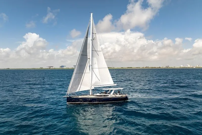 Slide: The Image of Sailing yacht Hylas H57 2025 on open sea under clear skies. - 14