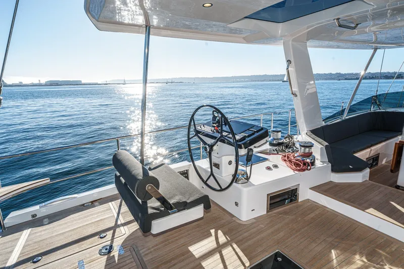 Slide: The Image of Luxurious 2025 Hylas H57 yacht cockpit with ocean view and modern steering wheel. - 17