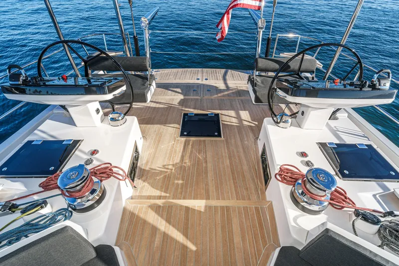 Slide: The Image of Luxury deck of 2025 Hylas H57 yacht with dual steering wheels and winches. - 18
