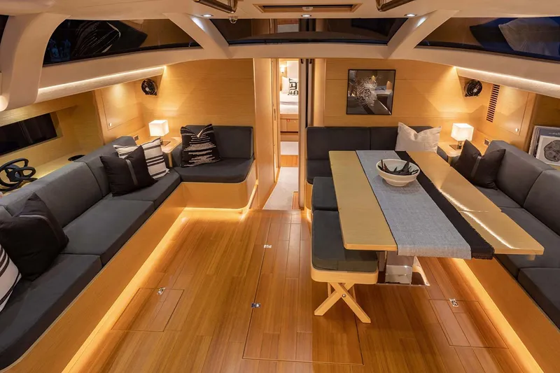 Slide: The Image of Manufacturer Provided Image: Luxurious interior of 2025 Hylas H57 yacht with elegant seating and dining area. - 25
