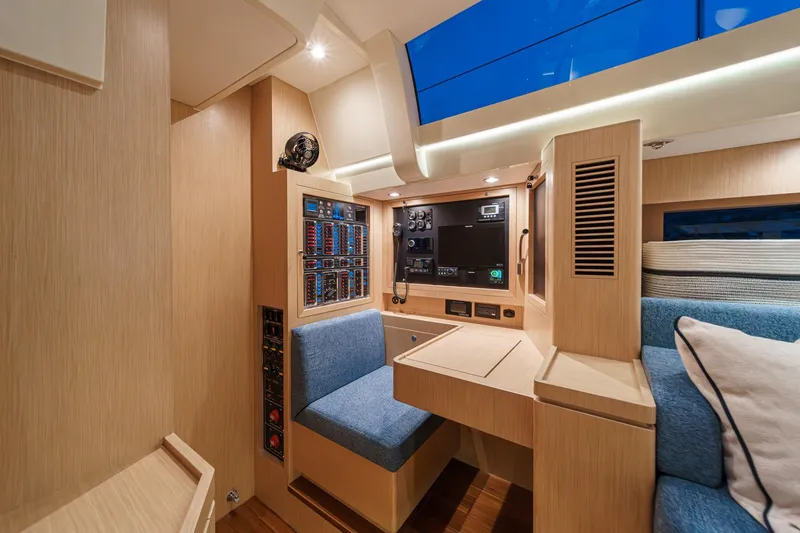 Slide: The Image of Luxurious interior of 2025 Hylas H57 yacht featuring modern navigation and control panels. - 30