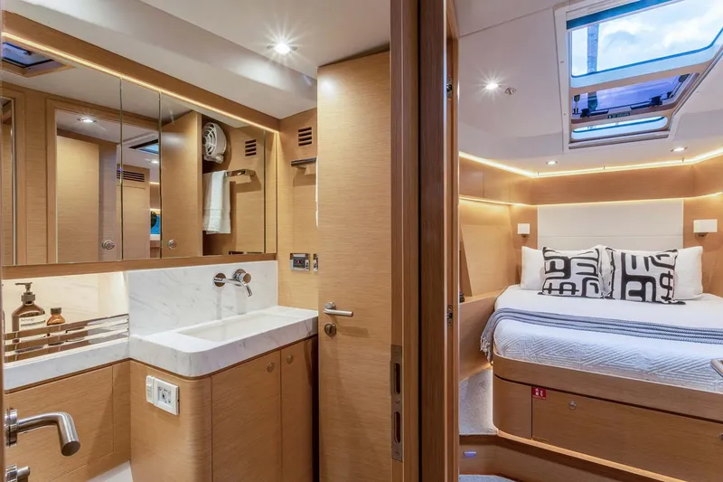Slide: The Image of Manufacturer Provided Image: Luxurious interior of 2025 Hylas H57 yacht featuring bedroom and bathroom. - 41