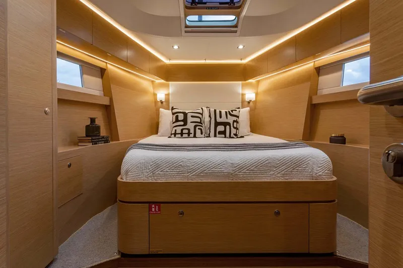 Slide: The Image of Manufacturer Provided Image: Luxurious cabin interior of 2025 Hylas H57 yacht with modern design and ambient lighting. - 44
