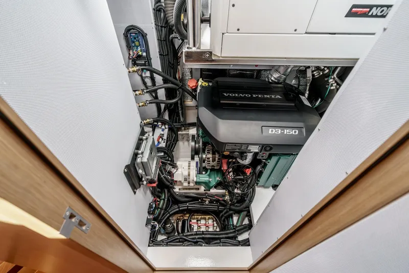 Slide: The Image of Engine room of 2025 Hylas H57 yacht featuring Volvo Penta D3-150 engine. - 53