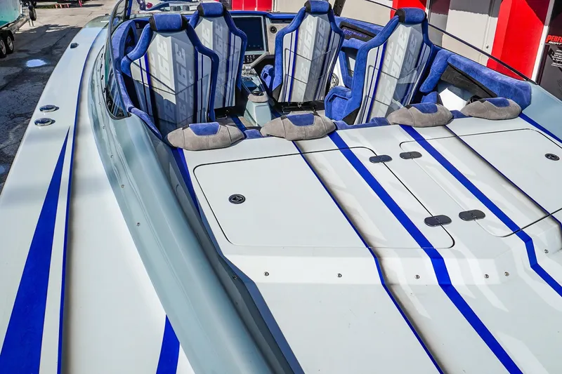 Slide: The Image of Luxury speedboat interior with blue accents, featuring Statement 396 model, 2026 design. - 13