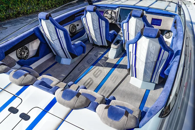 Slide: The Image of Luxurious interior of 2026 Statement 396 boat with blue and gray seating and modern design. - 15