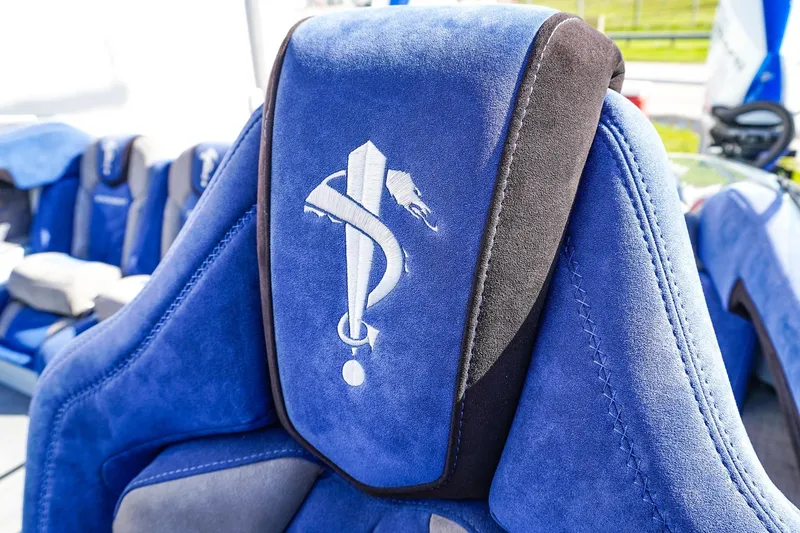 Slide: The Image of Blue suede seat with embroidered logo in 2026 Statement 396 model. - 22
