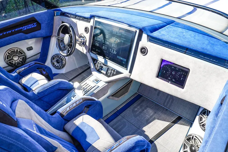 Slide: The Image of Luxurious 2026 Statement 396 interior with blue accents and advanced digital dashboard. - 25