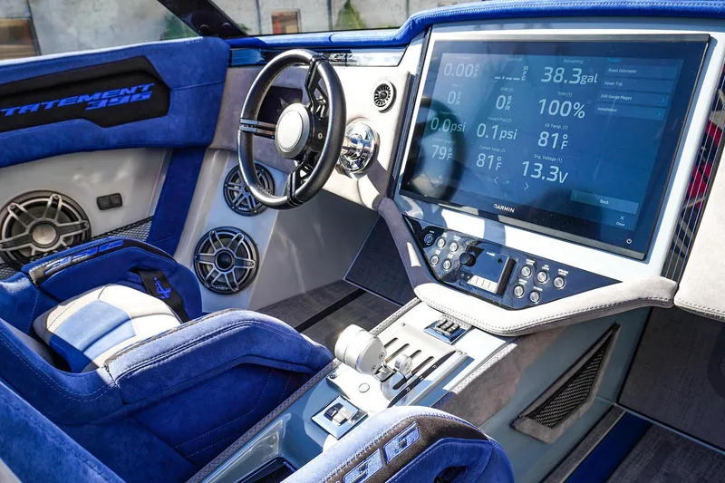 Slide: The Image of Luxurious 2026 Statement 396 interior with advanced touchscreen and plush blue seating. - 26