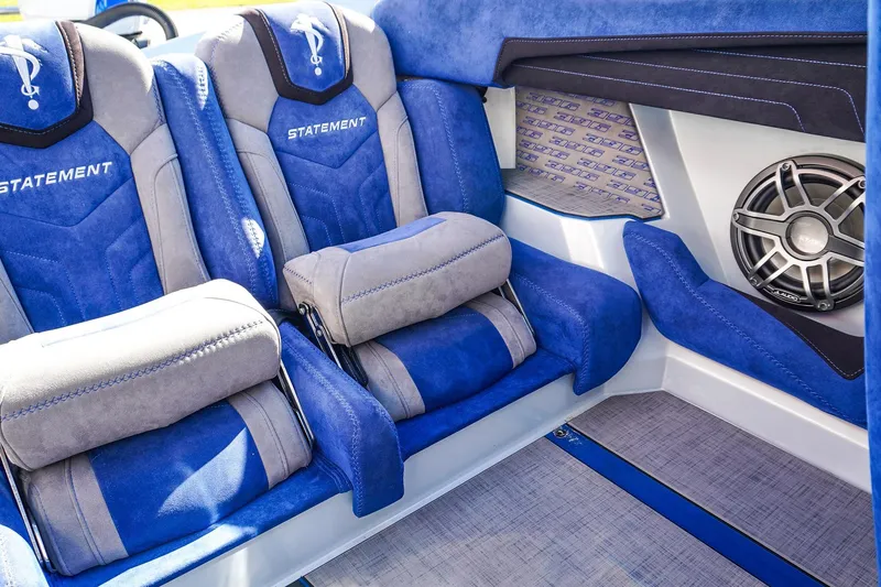 Slide: The Image of Luxurious blue and gray seating in 2026 Statement 396 boat interior with speaker system. - 29