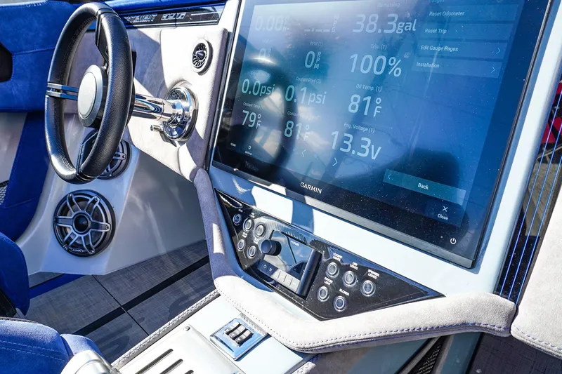 Slide: The Image of Dashboard of 2026 Statement 396 boat with Garmin display and controls. - 33