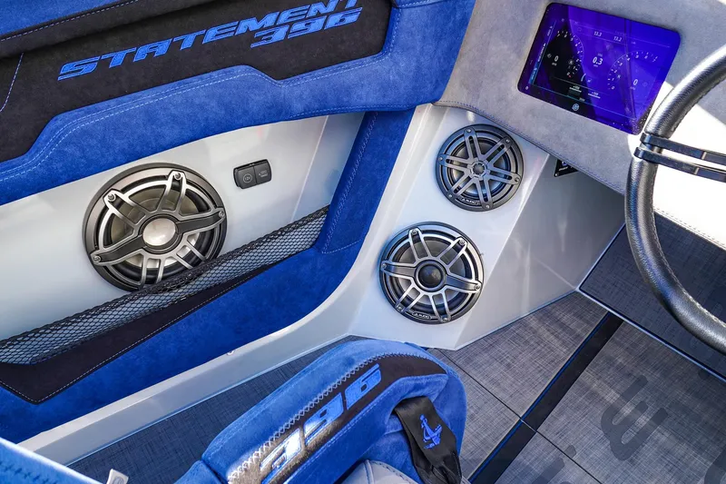 Slide: The Image of Interior of 2026 Statement 396 boat with blue upholstery and advanced audio system. - 35