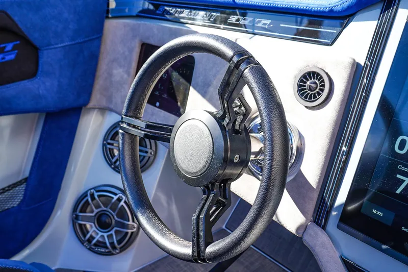 Slide: The Image of Steering wheel of 2026 Statement 396 boat with modern dashboard and speakers. - 37