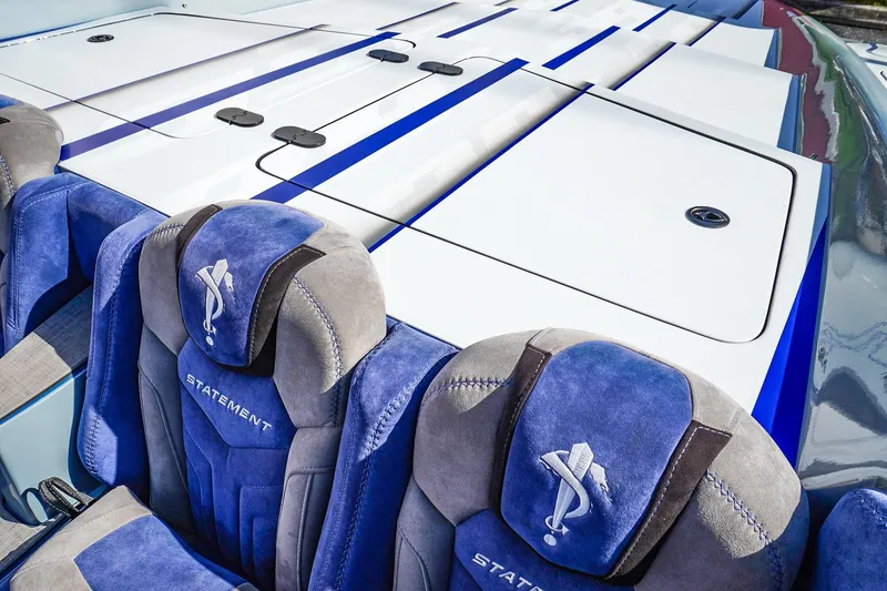Slide: The Image of Luxury boat interior with blue and gray seats, Statement 396 model, 2026 design. - 40