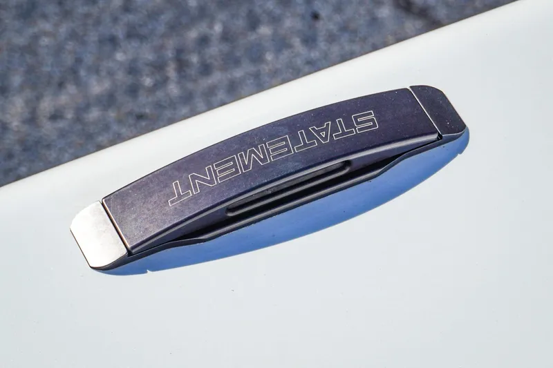 Slide: The Image of Close-up of Statement 396 handle on a white surface, 2026 model. - 42